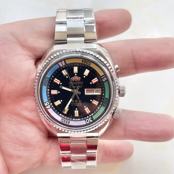 日本双狮海霸旋转大表盘全自动机械手表中老年防水双日历夜光腕表