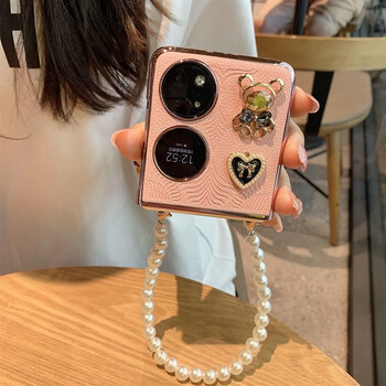 电镀皮纹粉色 水晶小熊 手 华为pockets