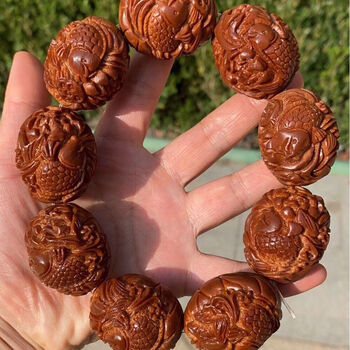 手工雕刻橄榄核手持九鲤戏莲印尼橄榄核雕刻鱼戏莲花年年有余男款 图片价格品牌报价 京东