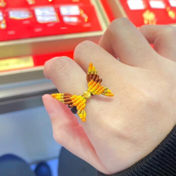 999足金在逃公主戒指女黄金猫眼转运珠蝴蝶结渐变手工编织指环小金珠