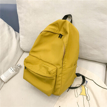 日系书包轻度少女古着感纯色双肩包尼龙简约校园学生ins时尚背包黄色