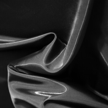玻璃记忆光泽亮面微光设计师面料diy服装外套礼服风衣布料 黑色 50cm