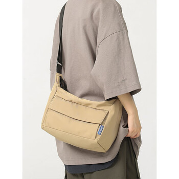羚舞日系单肩包男简约潮牌ins邮差包男士包包斜挎包学生背包小众lesha