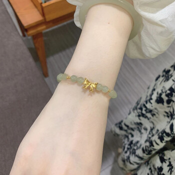 周大福0周大褔金 蝴蝶结手链女999转运珠和田玉手串在逃公主礼物送女