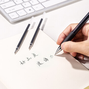 得力（deli）0.5mm拔帽中性笔芯签字笔水笔替芯 6600/33109/Q7适用  办公用品 子弹头黑色20支/桶33402