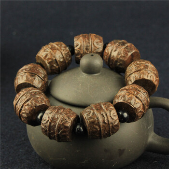 特价多款皮黑木雕刻佛头佛珠手链 男女通用手串饰品 开运手饰 聚宝盘