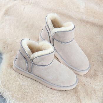 冬季新款雪地靴女低帮短靴皮毛一体加厚保暖棉鞋学生休闲真皮米白色35