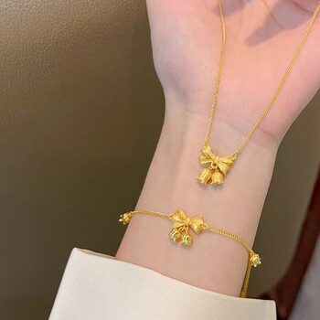 夕爱金楼在逃公主蝴蝶结铃兰花黄金项链女新款2023足金999套颈链吊坠