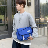 联想平替款草原雕男士斜挎包 大容量潮牌通勤单肩包邮差包女学生书包 蓝色【三色可选】