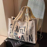 大容量帆布包女秋季外出短途旅行包休闲上班通勤托特包手提购物袋 黑字母 大包
