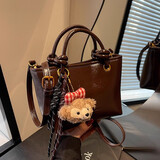 京智今年流行包包女秋冬百搭2025新款潮时尚斜挎手提小拎包水桶包 咖啡色【送挂件】