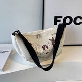 途尊小众帆布包包女2024春夏新款休闲大容量学生单肩通勤包斜挎饺子包 黑色 升级款加里衬款