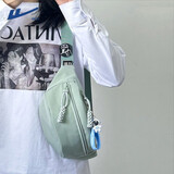回力ins国潮胸包男女简约休闲纯色斜挎小背包潮牌单肩包原宿风斜肩包 绿色【太空人挂件】