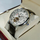 卡罗莱（CALUOLA）全自动机械表男士手表镂空飞轮真皮带男款手表防水学生潮流时尚 银壳白面 CA1064M-2 飞轮款