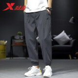 特步（XTEP） 运动裤短裤男裤子夏季男士休闲中裤跑步服黑色速干短裤五分裤男 深灰-梭织夏季薄款 L /175【现货速发】