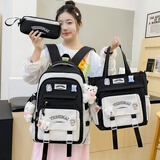 京腾书包女生初中生女童小学生四至六年级高颜值女孩大容量背包双肩包 黑色 三件套+大脸熊挂件
