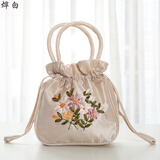 手拿包帆布手拿包抽绳布袋手机零钱包束口袋手工绣花小布包手提妈妈手拎小包烨白 7726(米白色)
