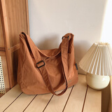 北慕斜挎包男ins潮日系简约大容量男士背包情侣单肩包女休闲学生挎包 棕色