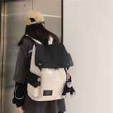 双星 背包男书包初高中大学生双肩包女15.6吋电脑包大容量旅行包 白配黑色【猩猩挂件+两个徽章】