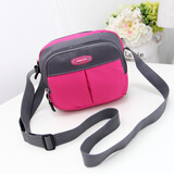 途尊（kingtrip） 新款牛津布包女包韩版单肩斜挎迷你小包包帆布时尚手机零钱包 横板玫红色