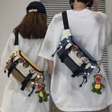 小憨象 斜挎包男士潮牌小型ins潮运动腰包小挎包夏季日系单肩包胸包男 蓝色【小恐龙+3个徽章】