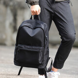 智纳 双肩包男学生潮流初高中生书包大容量户外旅行背包笔记本电脑包 黑色