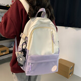 索亚特 书包女初中生简约韩版高中生轻便日系小清新高颜值中学生双肩包男 大容量大学生校园防水百搭背包 紫色+小花挂件
