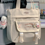 贞嘻帆布包手提包女士包包女包学生日系斜挎包大容量上课通勤单肩包 学院风斜挎包【徽章+挂件】米白