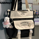 贞嘻帆布包手提包女士包包女包学生日系斜挎包大容量上课通勤单肩包 学院风斜挎包【徽章+挂件】黑色