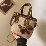 盛菲曼小众质感小包包女新款潮百搭单肩斜挎包时尚超火手提水桶包 棕色【挂件颜色随机】