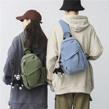 双星胸包女斜挎包男 学生手机包单肩包大容量休闲运动小背包 绿色【带猩猩玩偶挂件】