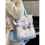 丛林鸟日系ins撞色学生手提袋补习袋 帆布斜挎包初中生大容量上课包包女 蓝色【饼干零钱包+3个徽章随机】