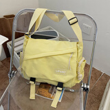 盛菲曼ins日系原宿复古工装斜挎包女韩国学生大容量邮差包男单肩背包潮 奶黄色【胖云朵+4个徽章随机】