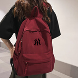 新款NY联名书包男日系初中女生高中生大容量双肩包简约纯色背包潮 酒红色
