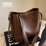 桃花洛复古休闲单肩包包女士2025七夕秋冬时尚水桶包小众潮流通勤斜挎包 咖啡色
