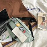 双星斜挎包男士胸包手机腰包女单肩包潮流运动小背包 绿色+徽章+小白鸭