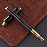 英雄（HERO）钢笔礼盒男女士签字笔礼品商务书法练字三年级中小学生定制刻字笔生日礼物E609 7006黑色0.5mm【简装】 F明尖0.5mm