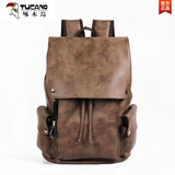 啄木鸟（TUCANO）2025新款复古双肩包潮流男士青年学院背包书包PU皮质男包 卡其色-