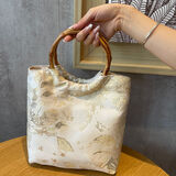 QUEEN TRIP百搭古风刺绣新中式手拿包提花汉服包女复古旗袍精致手挽竹节包 黄色