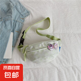 斜挎包女2025新款可爱腰包胸包夏天包包女式小挎包饺子包运动背包 奶绿色【送3徽章】 无规格