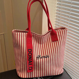 鹏境2025新款帆布手提单肩包包女时尚条纹大容量购物袋休闲通勤托特包 飘带条纹【靓丽红】