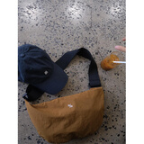 沐霓质感好棒韩国博主风牛角包斜挎包超轻大容量可单肩斜挎饺子包 棕色