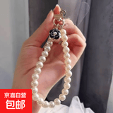 手机挂绳短款小香风水钻蝴蝶结吊坠时尚珍珠手腕挂链钥匙扣通用女 黑色山茶花+夹片