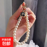 手机挂绳短款小香风水钻蝴蝶结吊坠时尚珍珠手腕挂链钥匙扣通用女 黑白混发山茶花+夹片