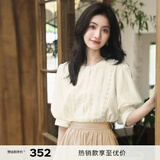 伊芙丽（eifini）伊芙丽韩系早春穿搭精致感钩花泡泡袖衬衫2024春装新款春日小上衣 米白 M 110-120斤