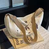 途尊小众帆布包包女2024春夏新款休闲大容量学生单肩通勤包斜挎饺子包 卡其色 升级款加里衬款