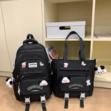 小鱼仙倌（XIAOYUXIANGUAN）书包小学生女生初中生减负两件套高中大学生大容量高颜值双肩包潮 黑色+徽章狗头挂饰 两件套书包