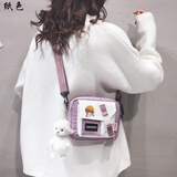 纸色  小女生包包斜跨包韩版新款可爱网红帆布小包包女新款日系可爱学生单肩包ins百搭撞色斜挎包 2065紫色【带挂件】 卡通小徽章