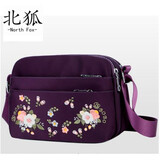 瑾安（JINAN）妈妈女包单肩斜挎包中老年人妇女士斜跨帆布小包包零钱老人斜背包 紫色