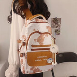 沫子（mozi）书包中学生初中生2026新款大学生简约百搭多层小众设计感少女背包 白配棕+毛球挂件